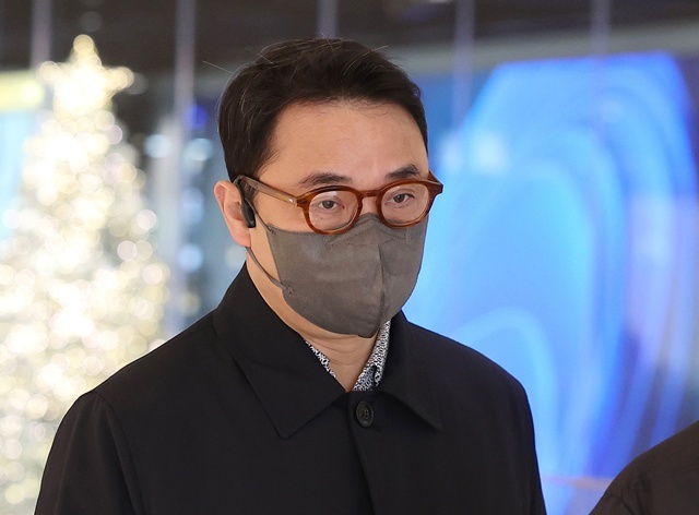 특검 출석하는 김진우씨 / 연합뉴스