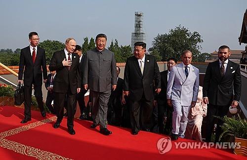 김정은 국무위원장이 등장하는 타임지 선정 100대 사진 / 연합뉴스